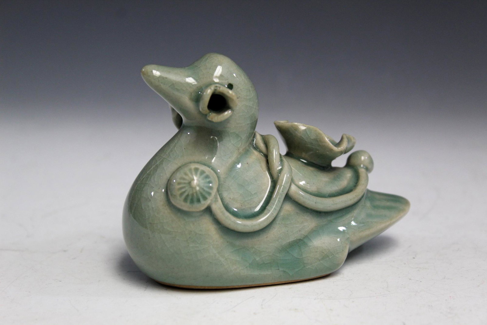 Korean Celadon Porcelain Duck-form Water Dropper.: Korean Celadon Porcelain Duck-form Water Dropper. H 7 cm. L 11 cm. Provenance: A Maryland Asian estate.