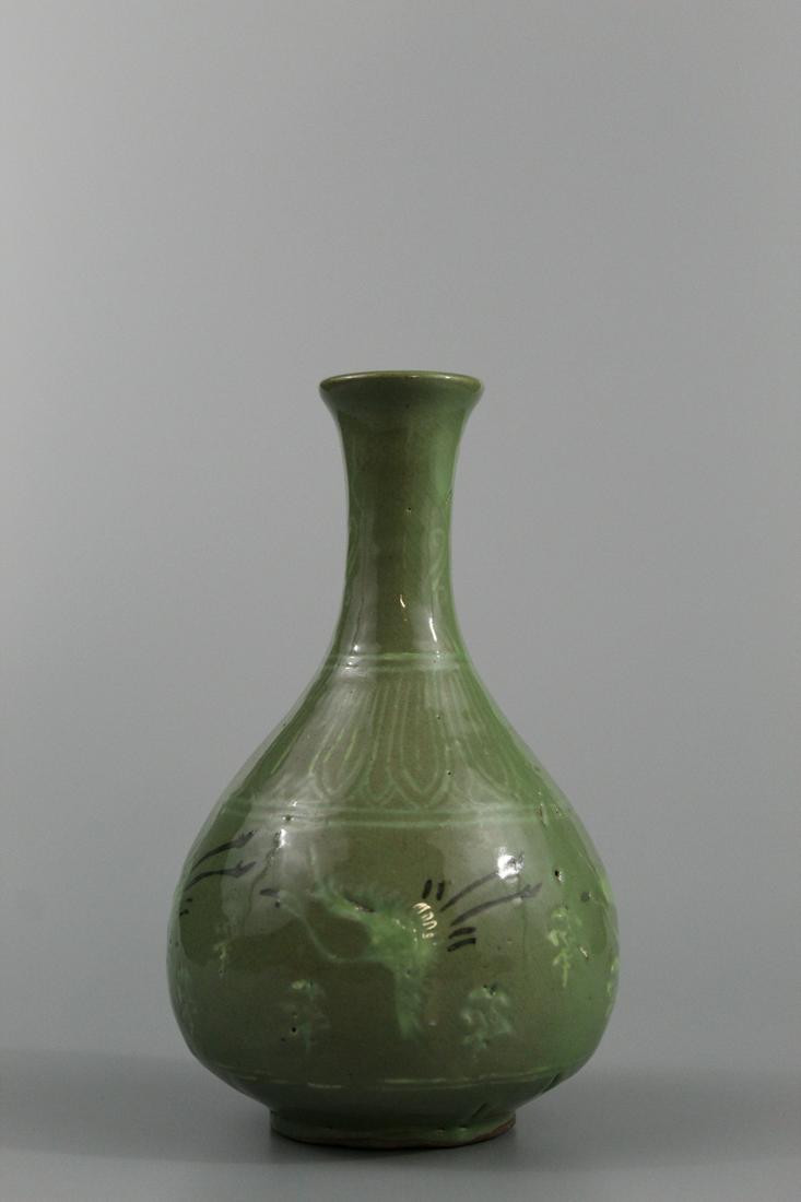 Korean celadon porcelain vase with crane decorations.: Korean celadon porcelain vase with crane decorations. Ht 16.5 cm.