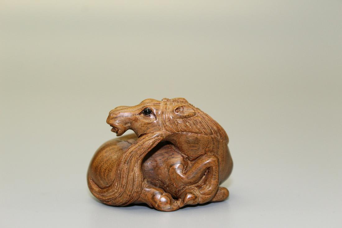 Dragon, Japanese wood carving, maker: Dragon, Japanese wood carving, maker's mark on the bottom. Width 5 cm. Height 3.5 cm.