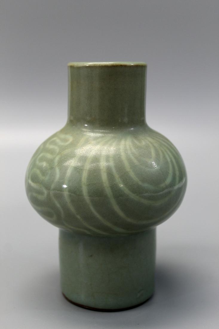 Korean celadon porcelain vase.: Korean celadon porcelain vase. Ht 13 cm.