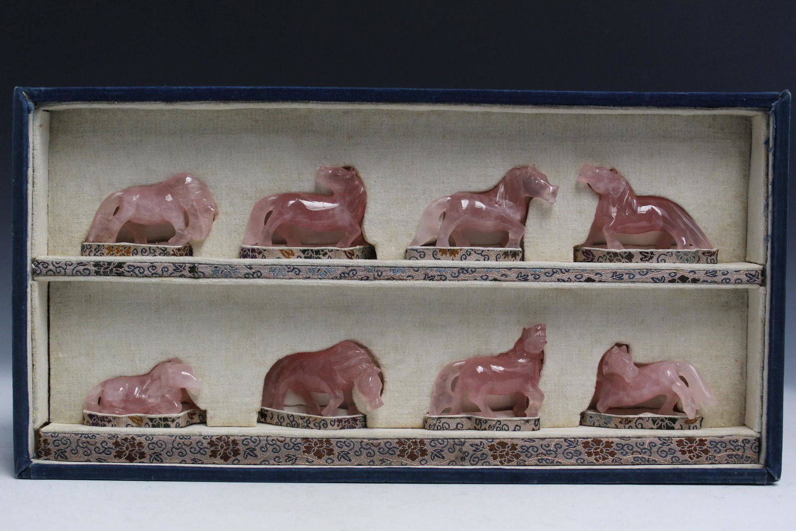 Group of eight Chinese carved rose quartz horses. (1 of 4)