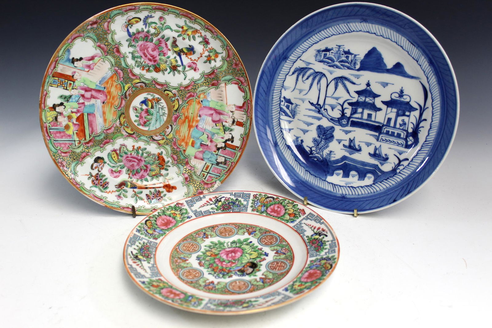 Three Chinese porcelain plates. (1 of 4)