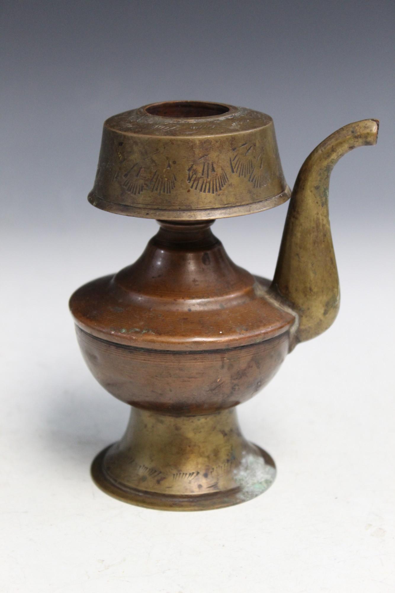 Tibetan Brass Ewer.: Tibetan Brass Ewer.. H 13 cm