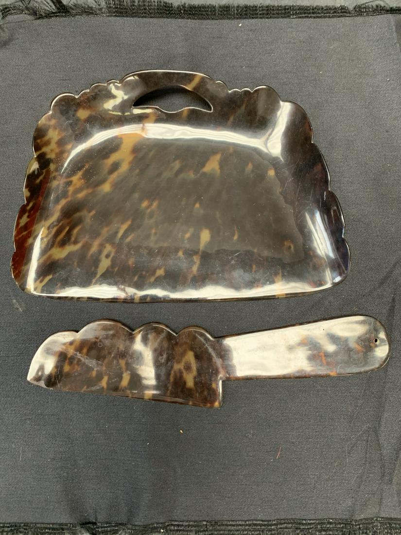 Tortoise shell tray and broom (1 of 2)