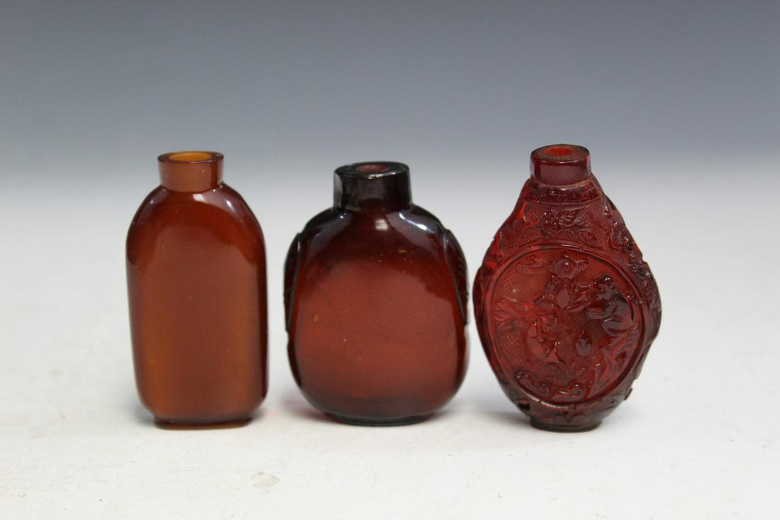 Three Chinese Red Glass Snuff Bottles (1 of 5)
