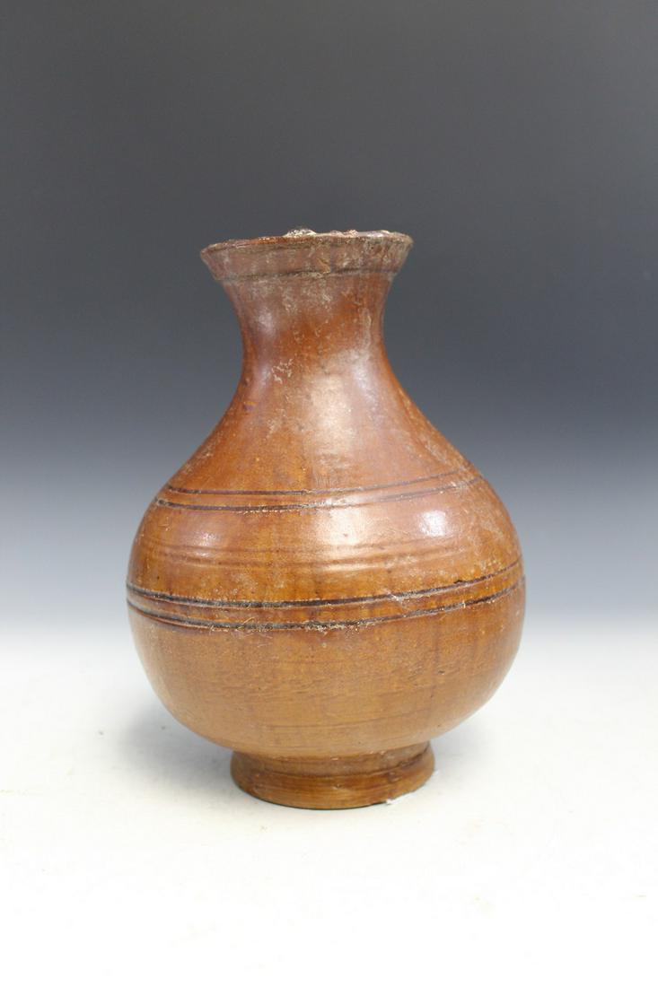 Chinese Han Dynasty Brown Glaze Vase: Chinese Han Dynasty Brown Glaze Vase. H 23 cm