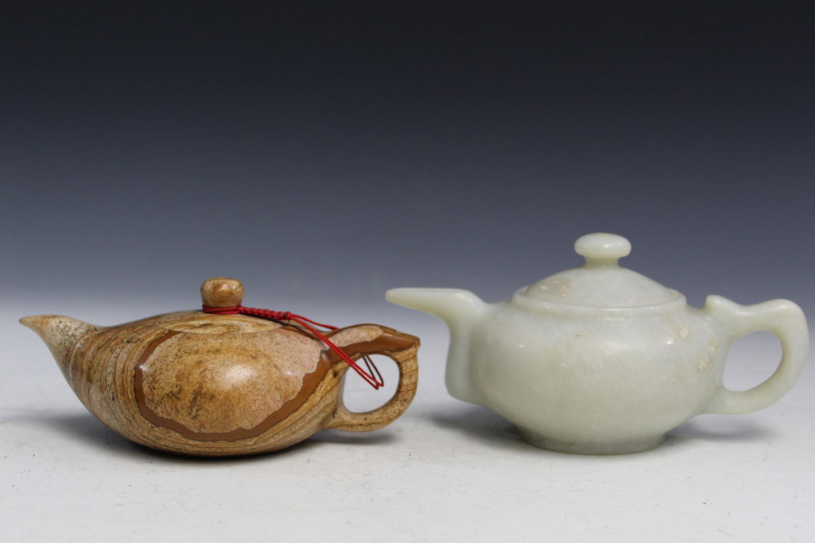Two Chinese Carved Stone Teapots. (1 of 4)