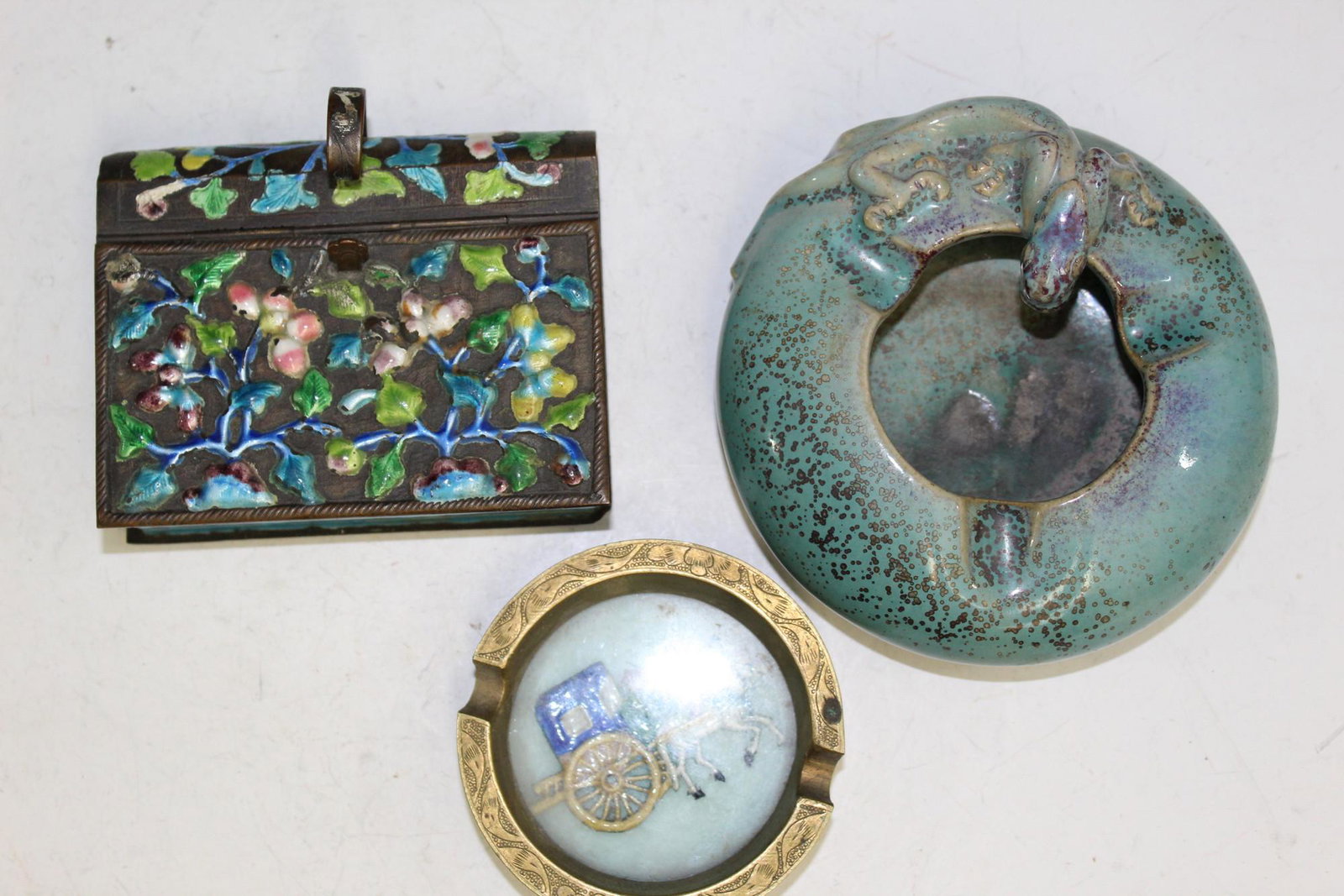 Three Chinese Ashtrays.: Three Chinese Ashtrays.. Diam 8 and 11 cm.
