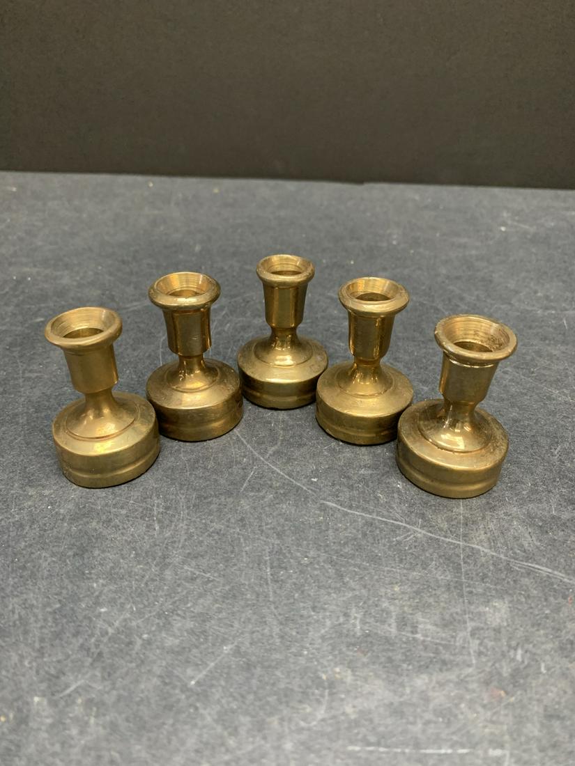Lot of five vintage brass candle stick holders or paper (1 of 1)