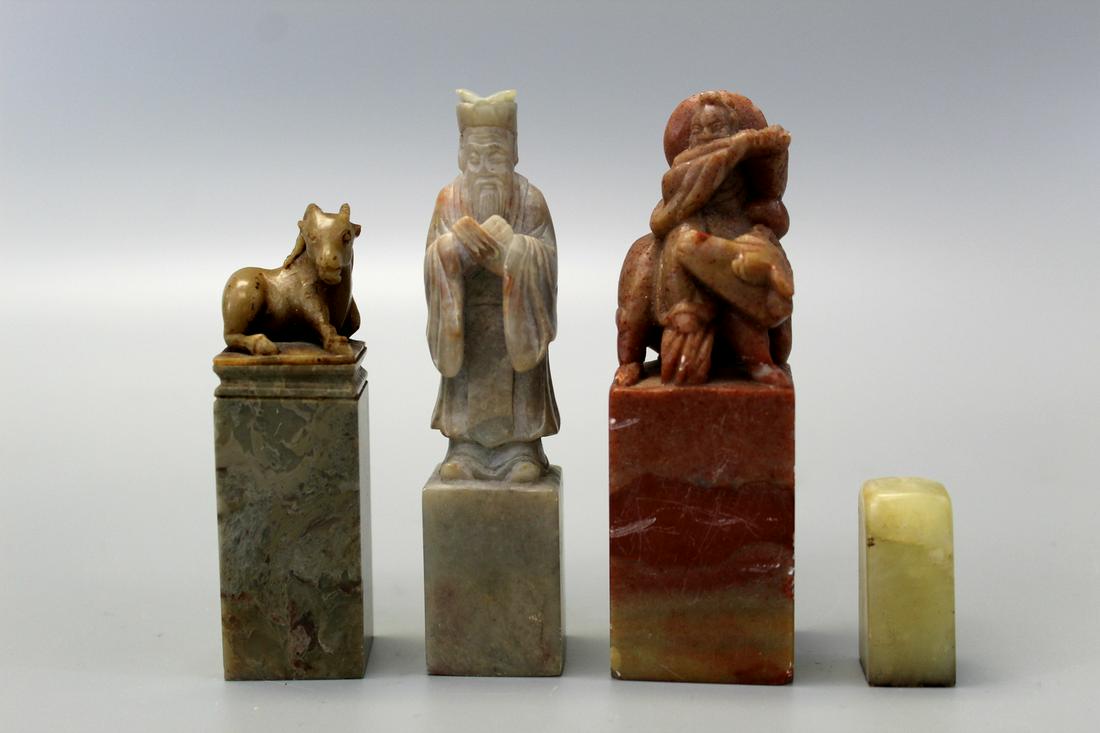 Four Chinese carved soapstone seals. (1 of 4)