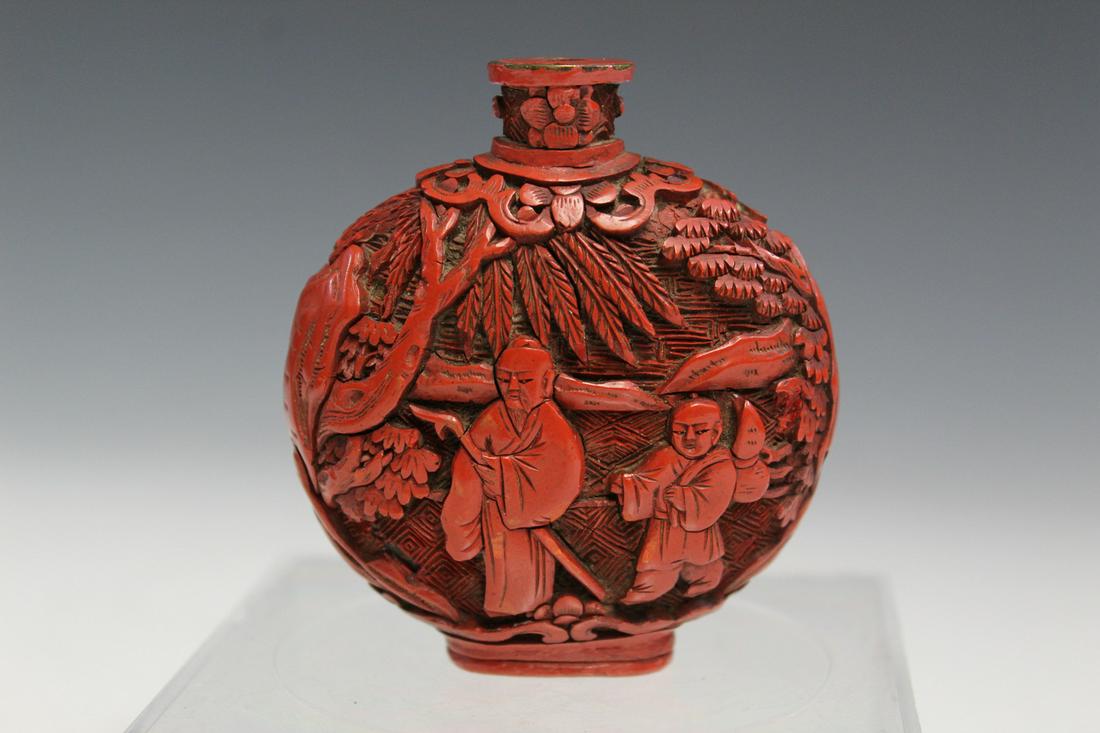 Chinese Carved Cinnabar Snuff Bottle.: Chinese Carved Cinnabar Snuff Bottle. H with lid 7.0 cm