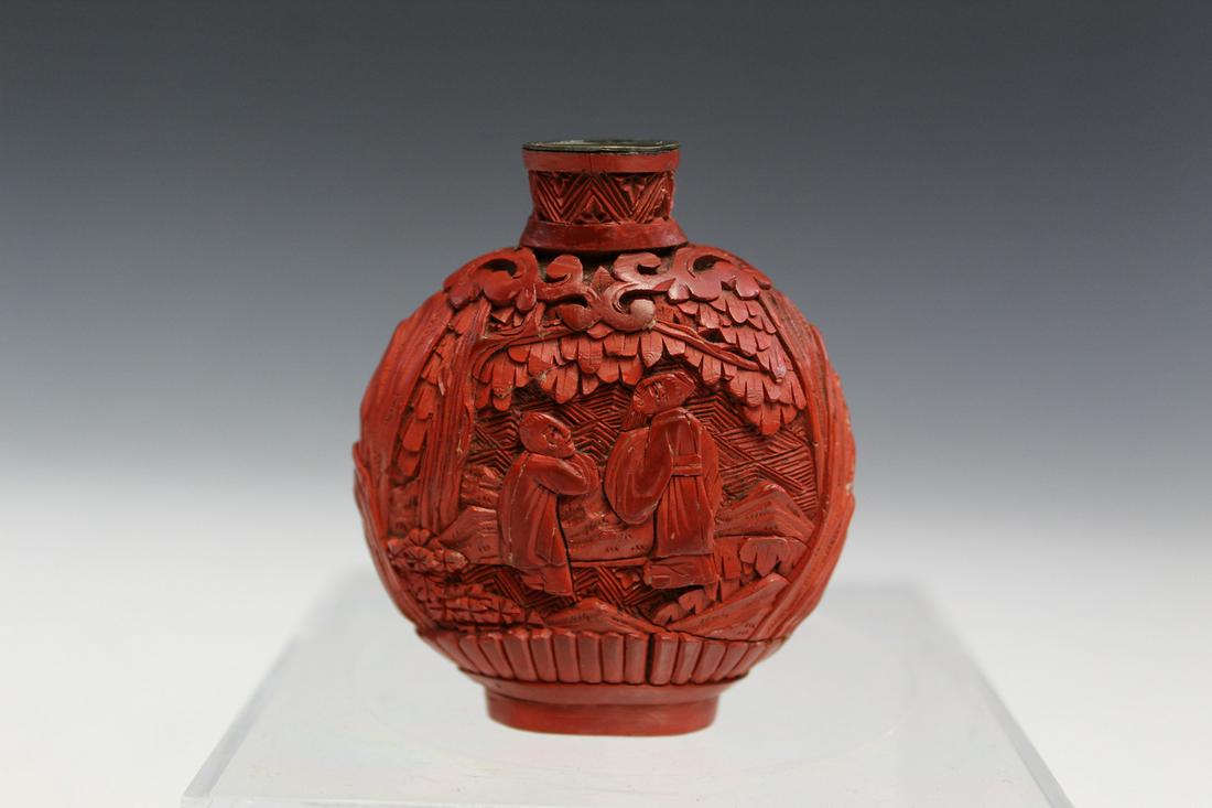 Chinese Carved Cinnabar Snuff Bottle.: Chinese Carved Cinnabar Snuff Bottle. H with lid 6.5 cm