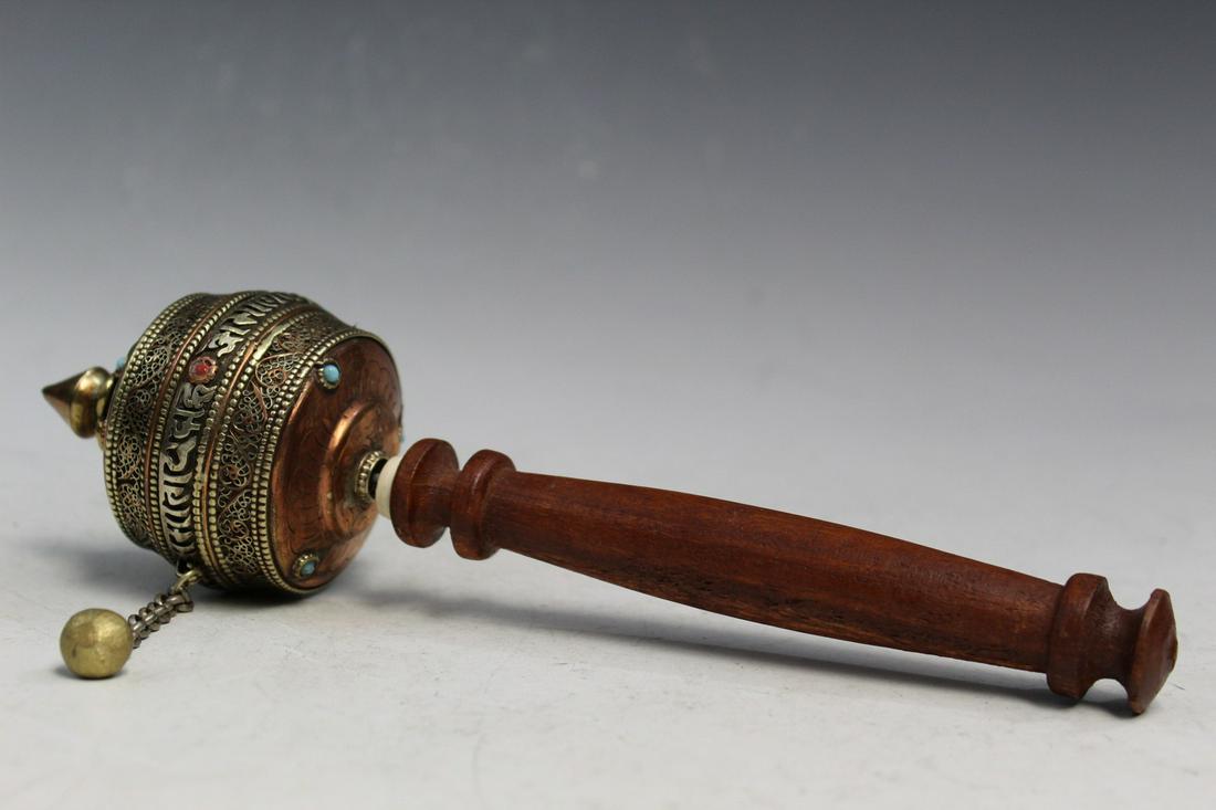 Tibetan Buddhist Wheel: Tibetan Buddhist Wheel. L 25 cm