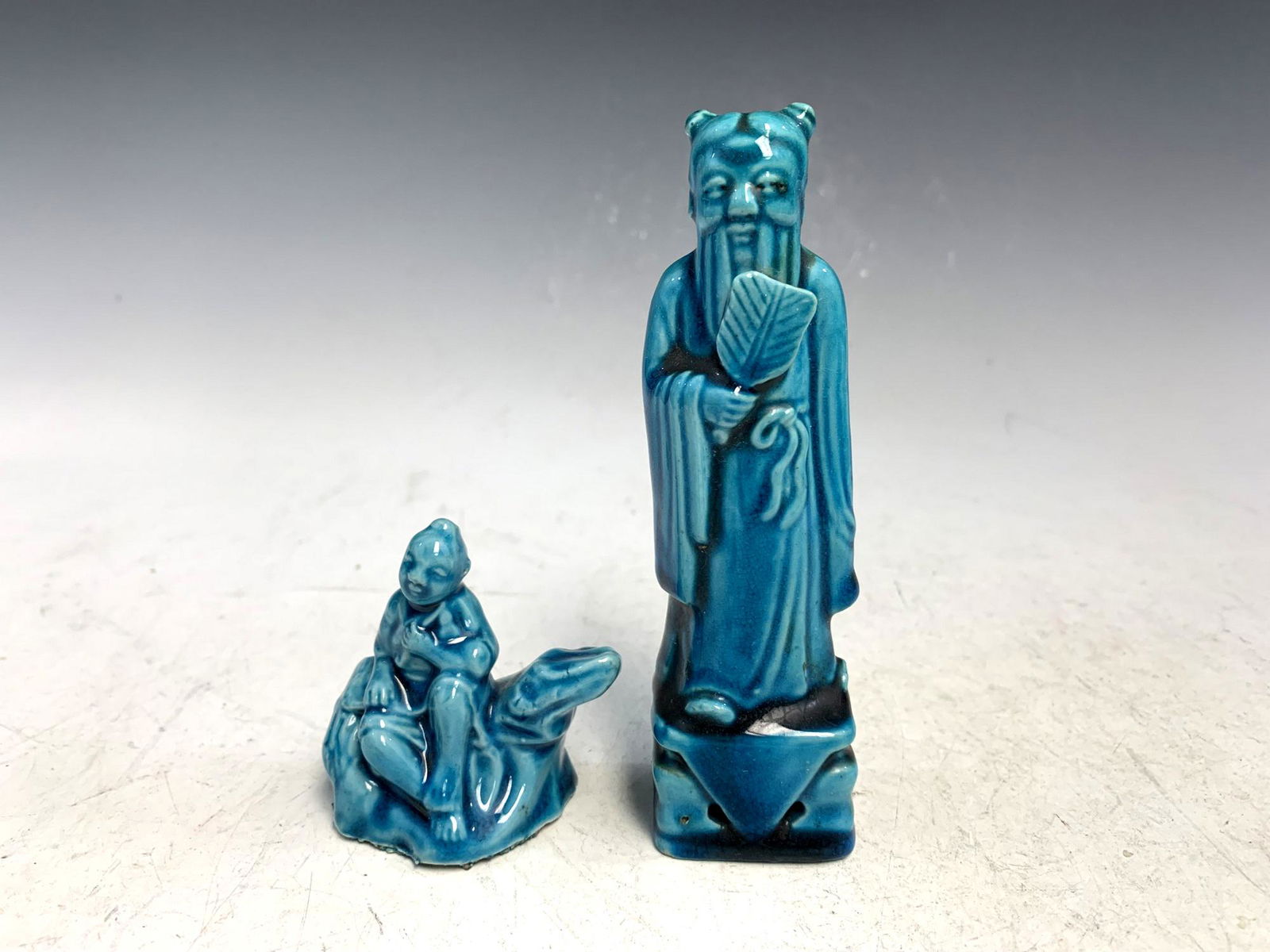 Two Chinese blue glazed figures. (1 of 7)