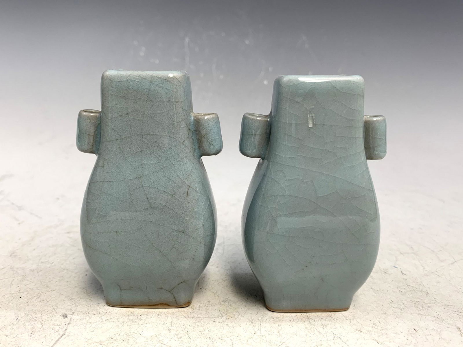 Pair of miniature Chinese celadon porcelain vases. (1 of 3)