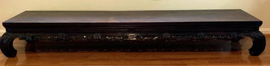 Chinese carved wood coffee table.