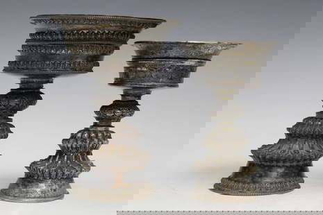 Two Tibetan Silver Oil Lamps: Two Tibetan Silver Oil Lamps. H 12 and 10.5 cm