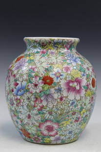 Chinese Famille Rose Porcelain Jar with Hundred-flower Decorations: Chinese Famille Rose Porcelain Jar with Hundred-flower Decorations. H 23 cm, Diam 19 cm.