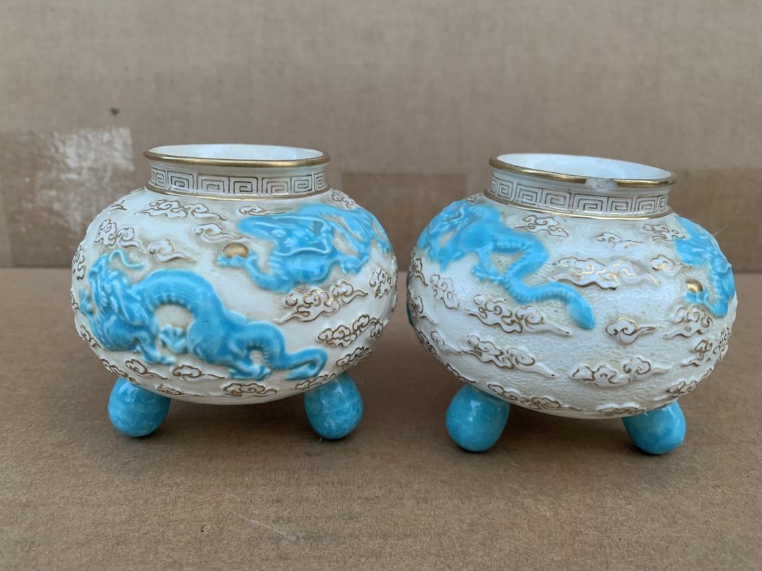 Pair of porcelain incense burners: Pair of porcelain incense burners. Ht 9 cm. Diameter 9 cm.