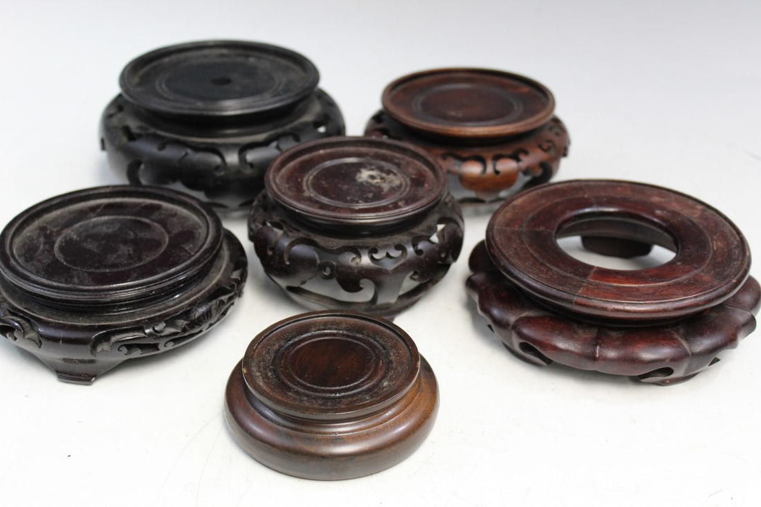 Group of Six Chinese Wood Stands: Group of Six Chinese Wood Stands. Largest inner rim diam 11.5 cm