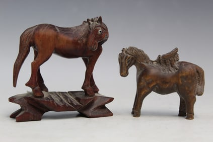 Two Chinese Carved Figurines of Horses.