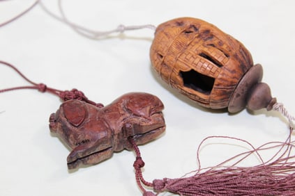 Two Chinese Carved Pendants