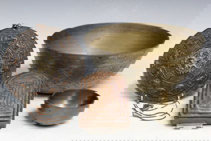 Group of Tibetan Metal Decorative Items