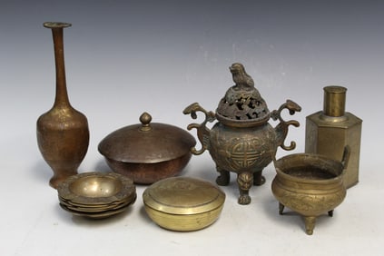 Group of Asian brass decorative items
