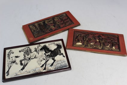 Pair of Chinese gilt wood plaques and a porcelain plaque.