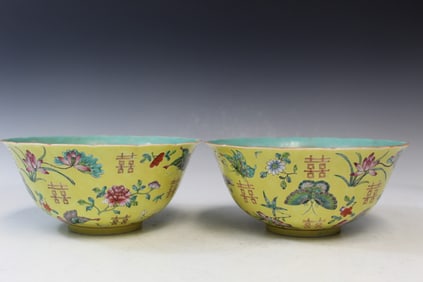 Pair of Yellow Ground Famille Rose Porcelain Bowls, Qianlong Mark.