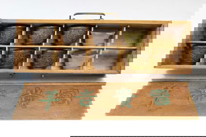 Chinese carved coconut and serpentine jade cups in a wood box.