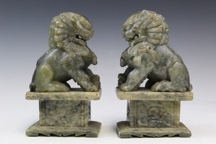 Pair of Chinese Carved Serpentine Jade Foo Dog Bookends.