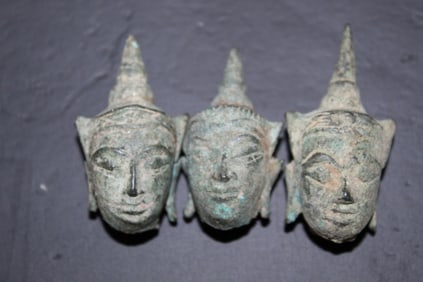 Three Southeast Asian Bronze Miniature Buddha Heads