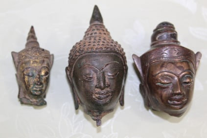 Three Antique Southeast Asian Bronze Buddha Heads