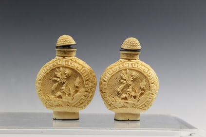 Pair of Chinese Cinnabar Snuff Bottles