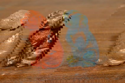 Two Carved Stone Dog Figurines