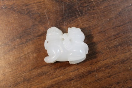 Chinese Carved White Jade Pendant of Two Foo Dogs