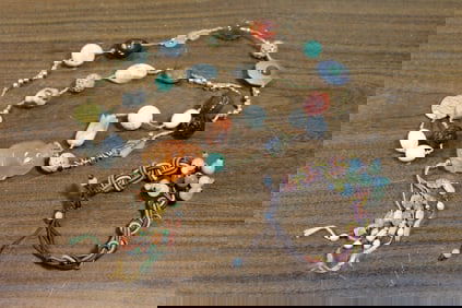 Gemstone beaded necklace and bracelet, including agate, red coral and turquoise beads.