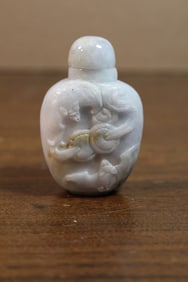 Carved jadeite snuff bottle