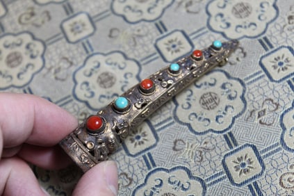 Chinese nail protector brooch