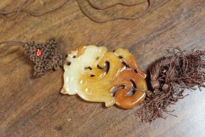 Carved jade pendant