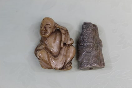 Two Chinese Carved Stone Pendants