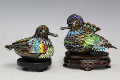 Two Chinese enameled bird boxes.