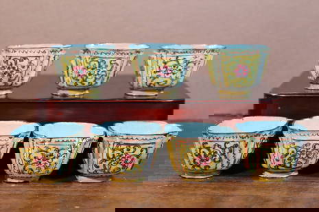 Seven Chinese enamel wine cups: Seven Chinese enamel wine cups. H 3 cm. Diam 4.5 cm.