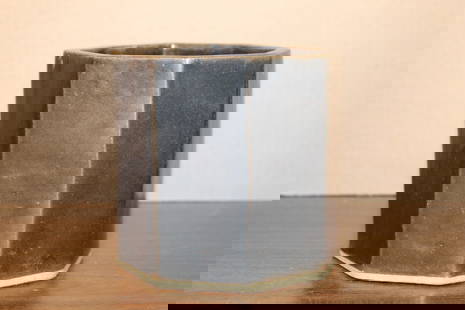 Chinese dark glazed pottery brush pot: Chinese dark glazed pottery brush pot. H 13 cm. Diam 13 cm.