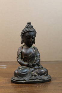 Chinese Bronze Buddha Statue: Chinese Bronze Buddha Statue. H 12 cm.