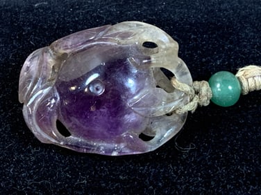 Carved Amethyst Pendant
