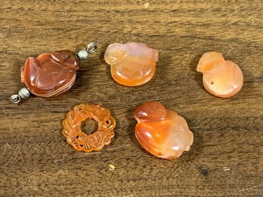 Five Carved Agate Pendants