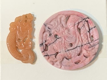 Two Carved Pendants