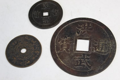 Three Asian Metal Plaques
